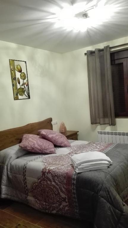Postel nebo postele na pokoji v ubytování Entre las Piedras y musgo