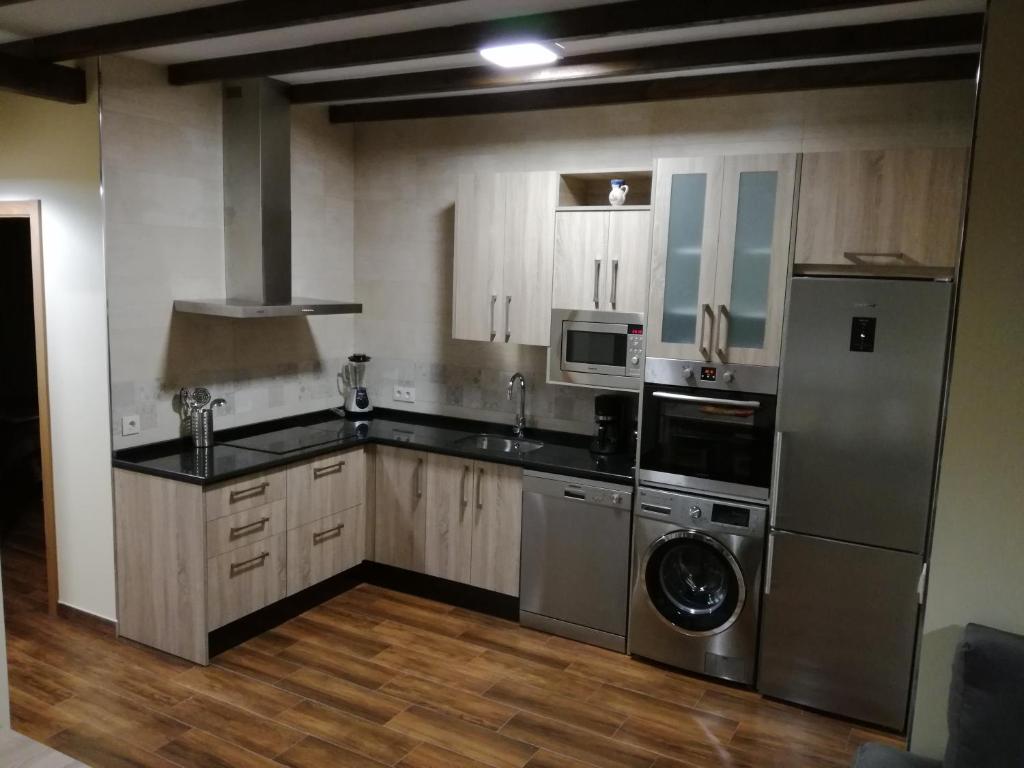 Kuchyň nebo kuchyňský kout v ubytování Casa Rural Mirador del Valle