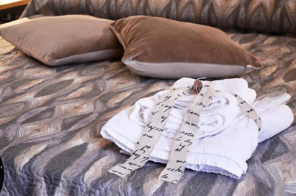 Postel nebo postele na pokoji v ubytování CASA FELICE Maison de Charme