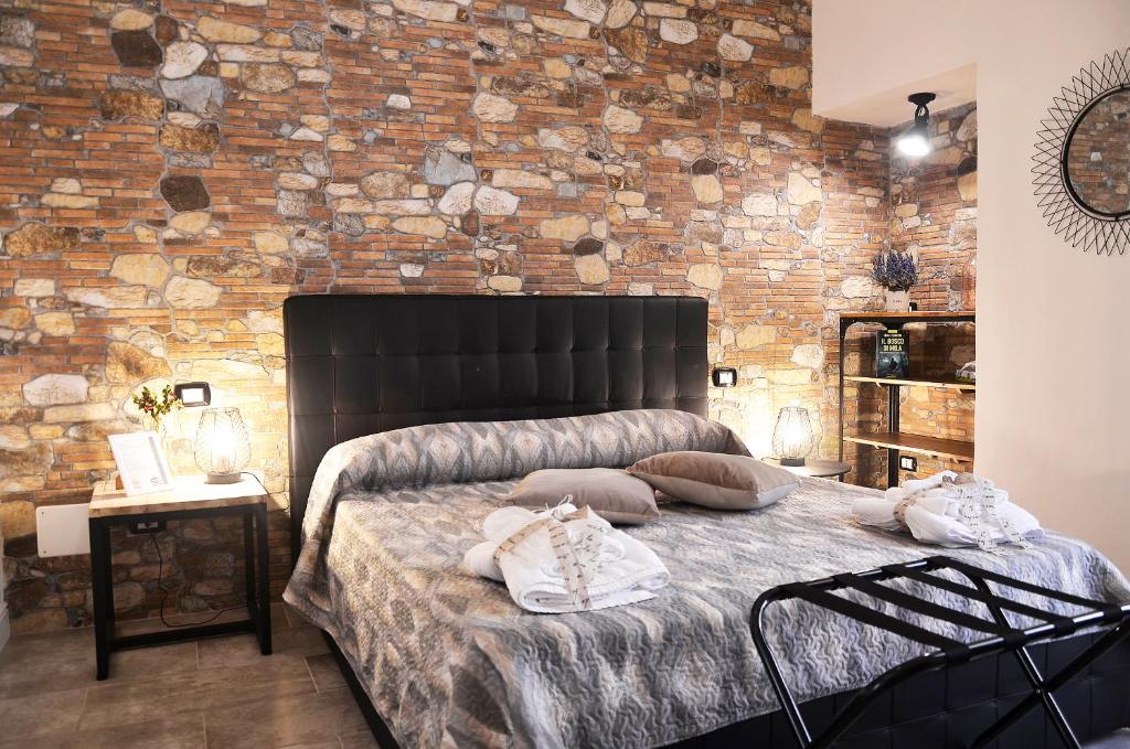 Postel nebo postele na pokoji v ubytování CASA FELICE Maison de Charme
