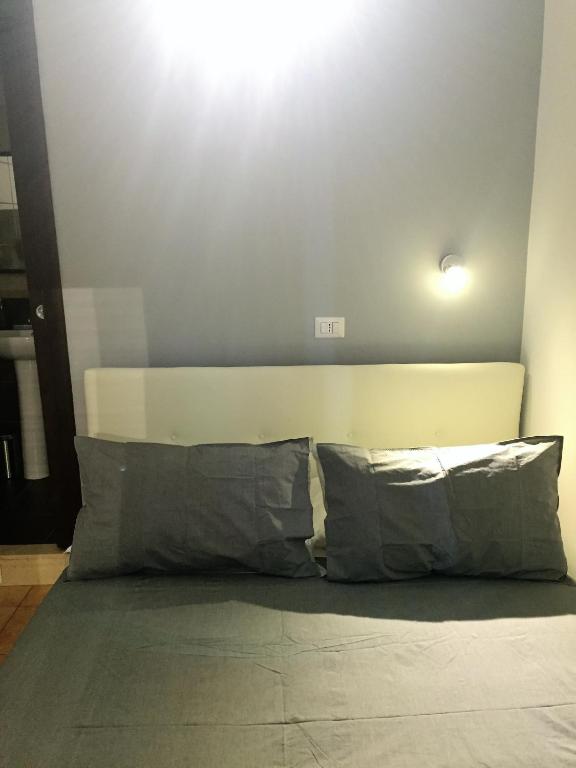 Łóżko lub łóżka w pokoju w obiekcie Bakirooms