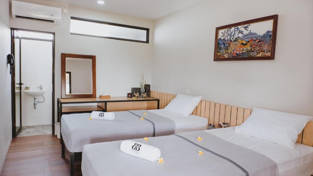 Postel nebo postele na pokoji v ubytování Borobudur Bed & Breakfast