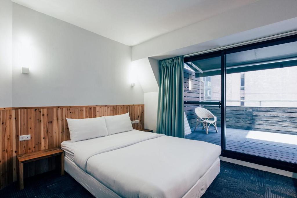 Postel nebo postele na pokoji v ubytování Star Hostel Taipei East