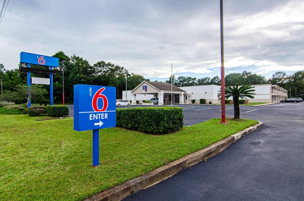 a sign for a energy gas station at Motel 6-Bay Minette, AL in Bay Minette
