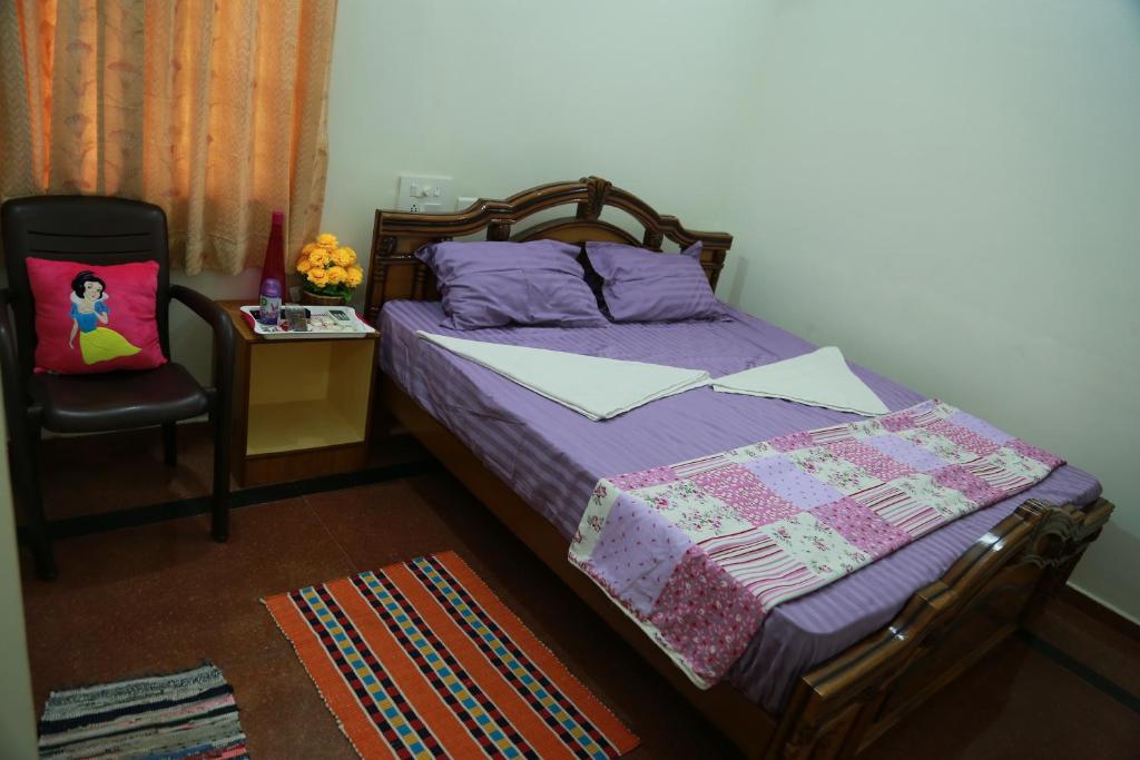 Postel nebo postele na pokoji v ubytování Coimbatore Home Stay & Serviced Apartment
