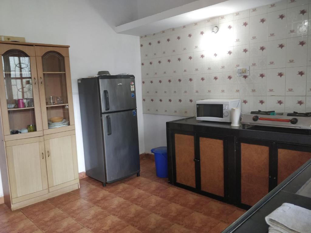 Kuchyň nebo kuchyňský kout v ubytování Koito-House calangute guest house