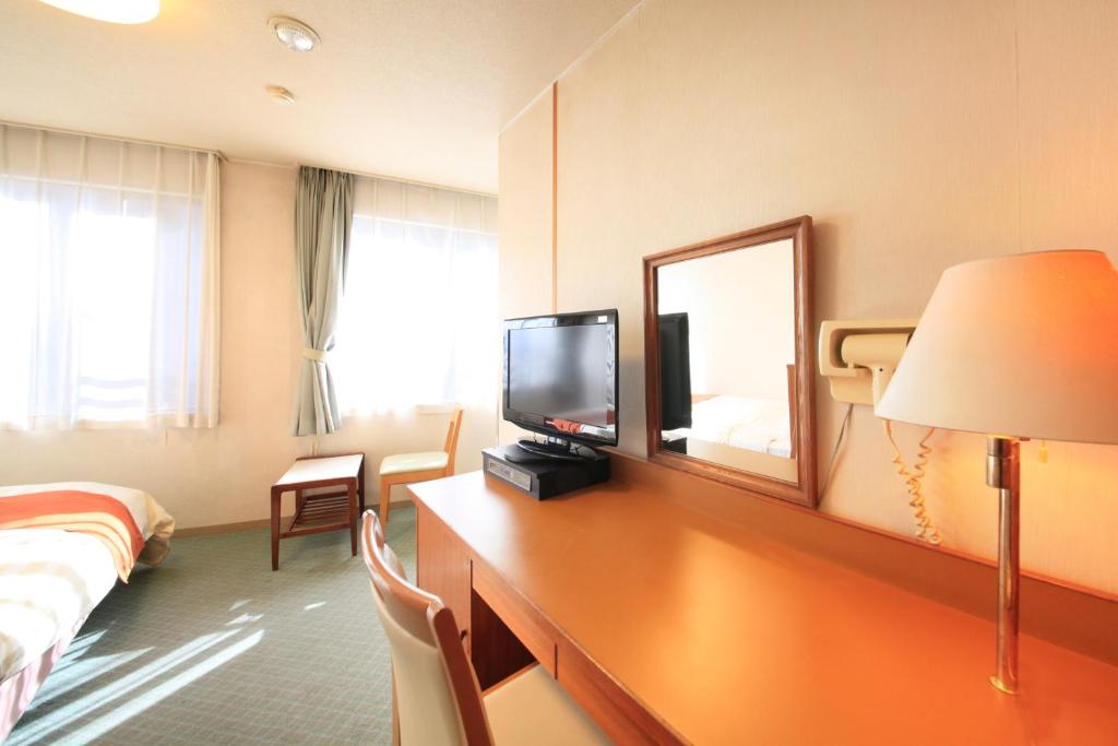 TV a/nebo společenská místnost v ubytování Fuji Green Hotel
