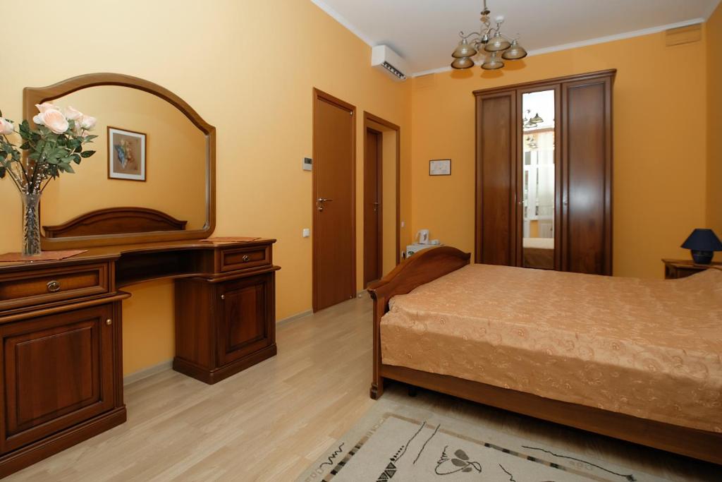 Кровать или кровати в номере Отель Лира