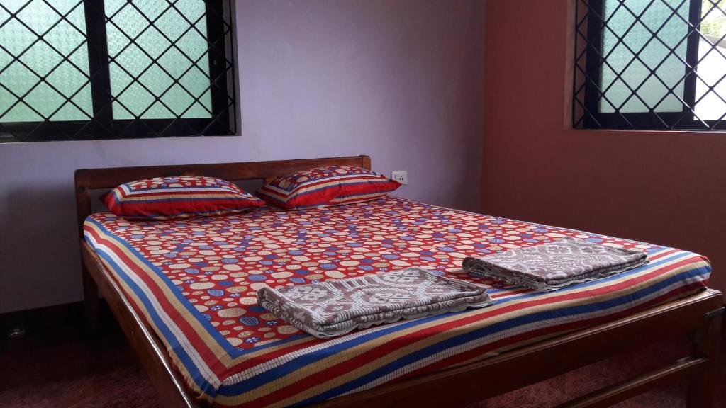 Postel nebo postele na pokoji v ubytování Chill Inn Guest House