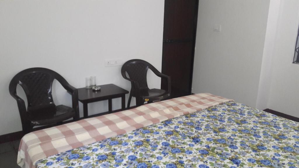 Postel nebo postele na pokoji v ubytování Chill Inn Guest House