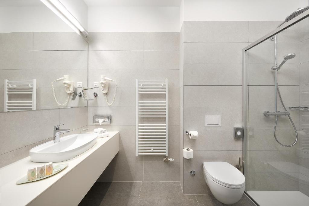Kúpeľňa v ubytovaní Hotel Salona Palace