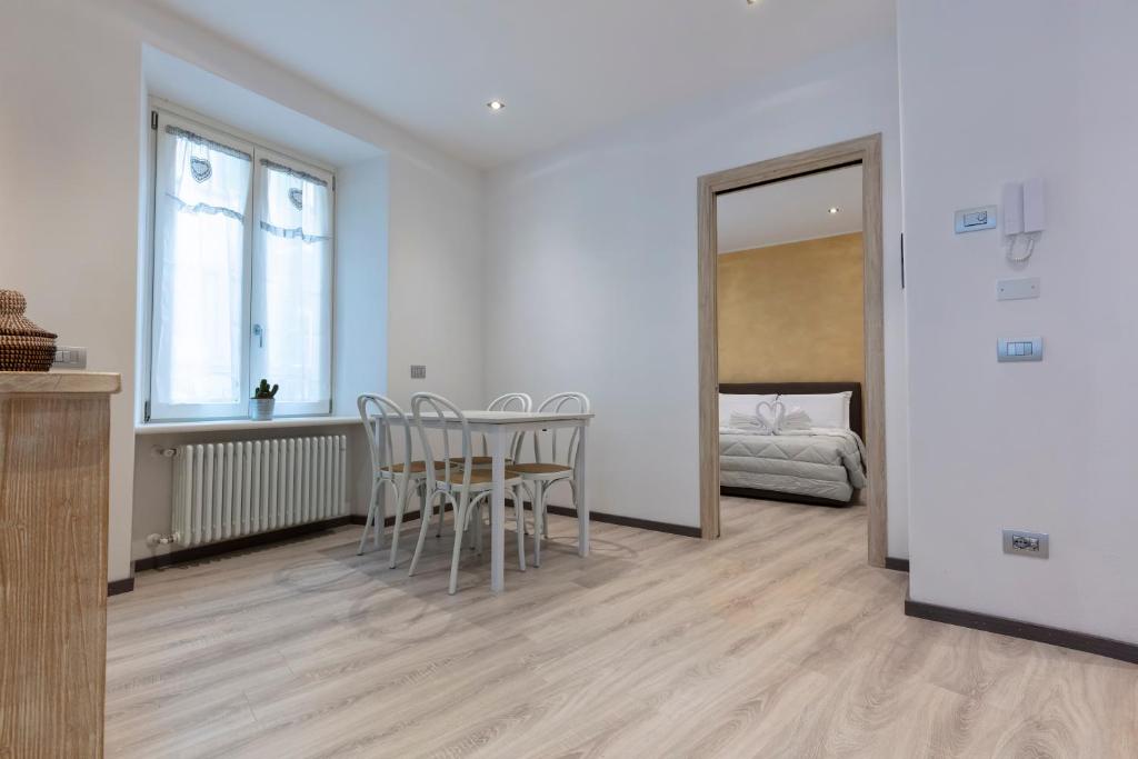 Łóżko lub łóżka w pokoju w obiekcie San Bernardino 19