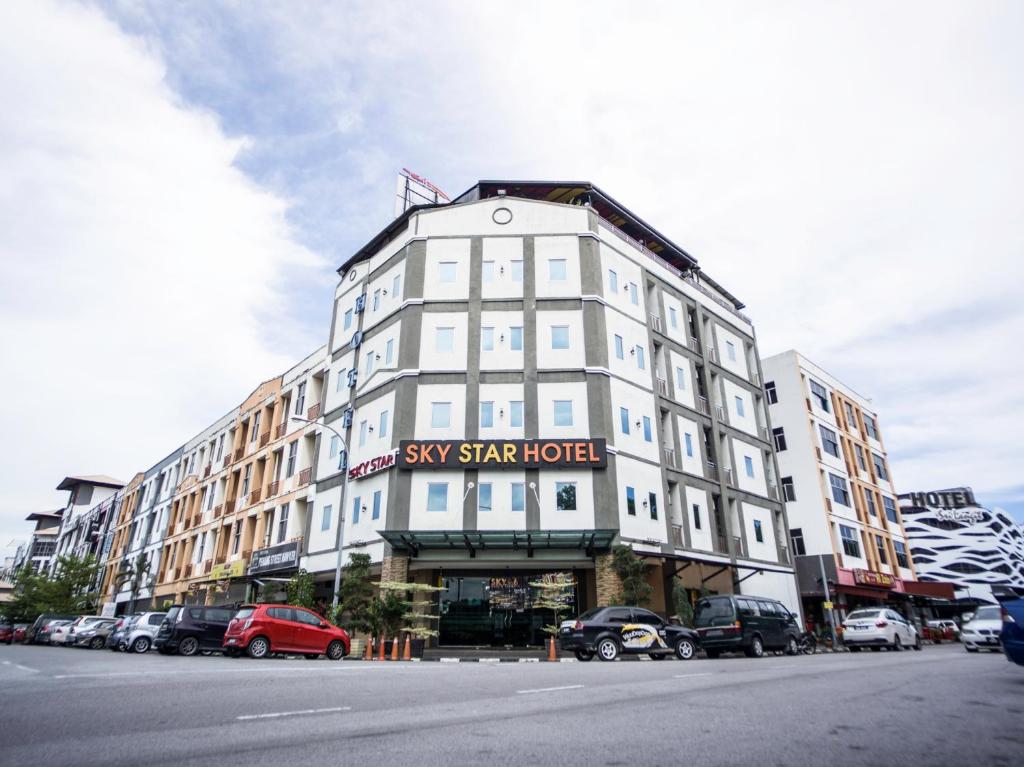 a large white building with a sky star hotel at Sky Star Hotel KLIA/KLIA2 in Sepang