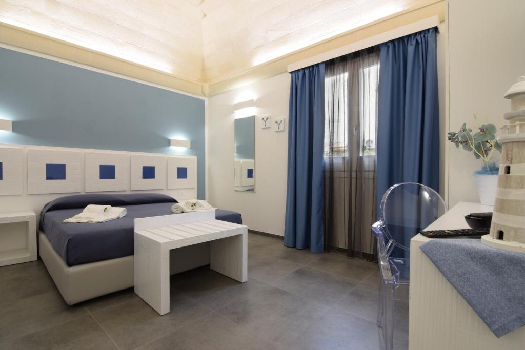 Postel nebo postele na pokoji v ubytování Pharos