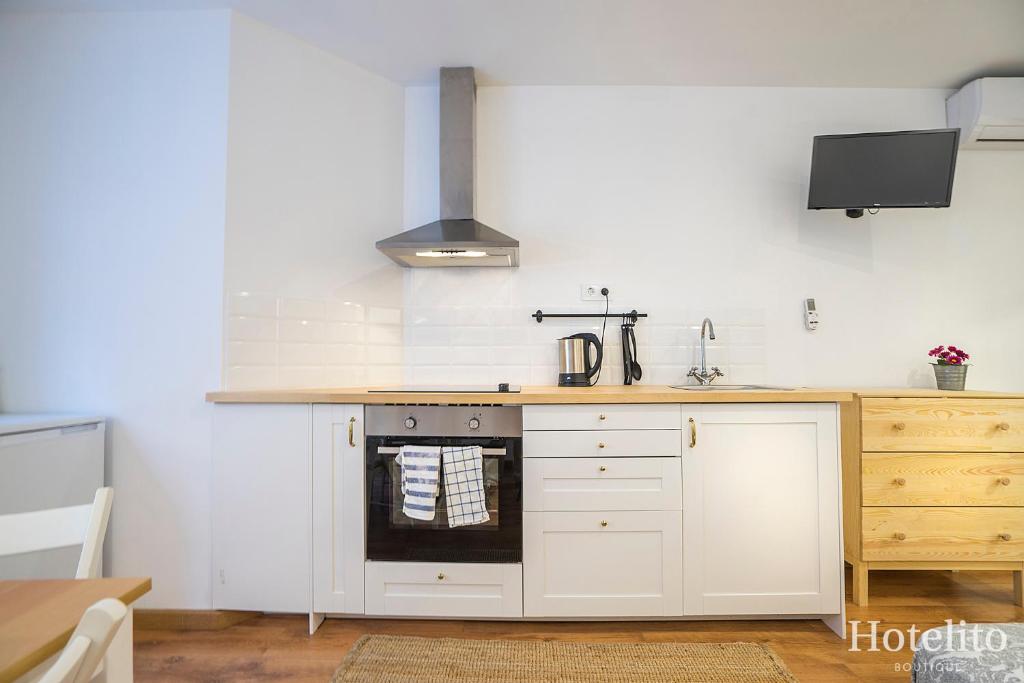 Kuchyň nebo kuchyňský kout v ubytování Hotelito Boutique Cinca