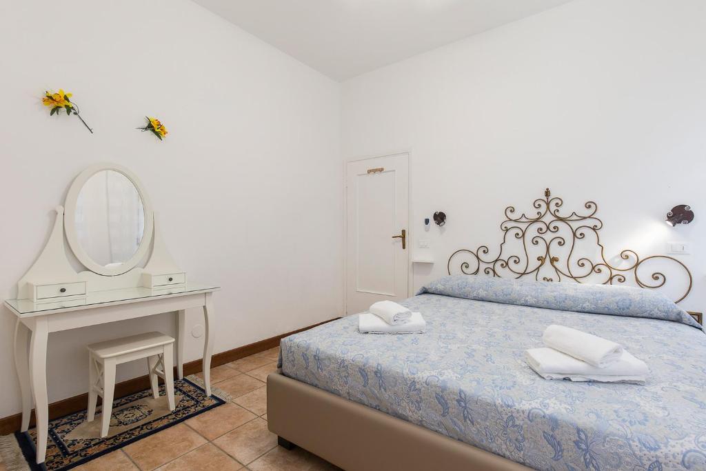 Posteľ alebo postele v izbe v ubytovaní Rampolina view by Impero House