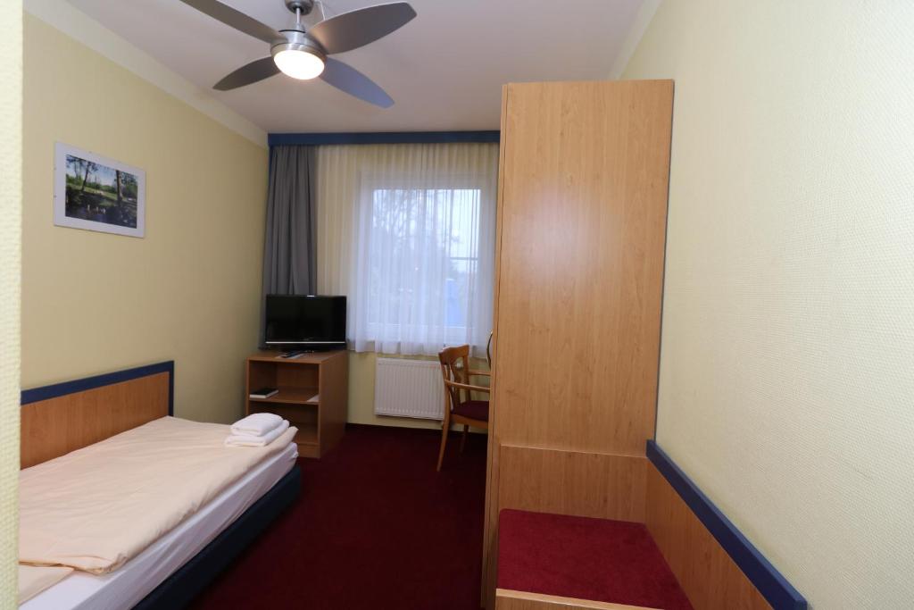 Postel nebo postele na pokoji v ubytování Radduscher Hafen