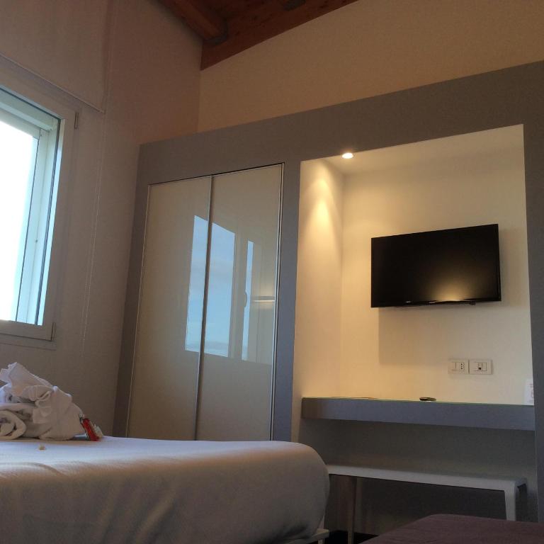 Postel nebo postele na pokoji v ubytování 15.92 Hotel