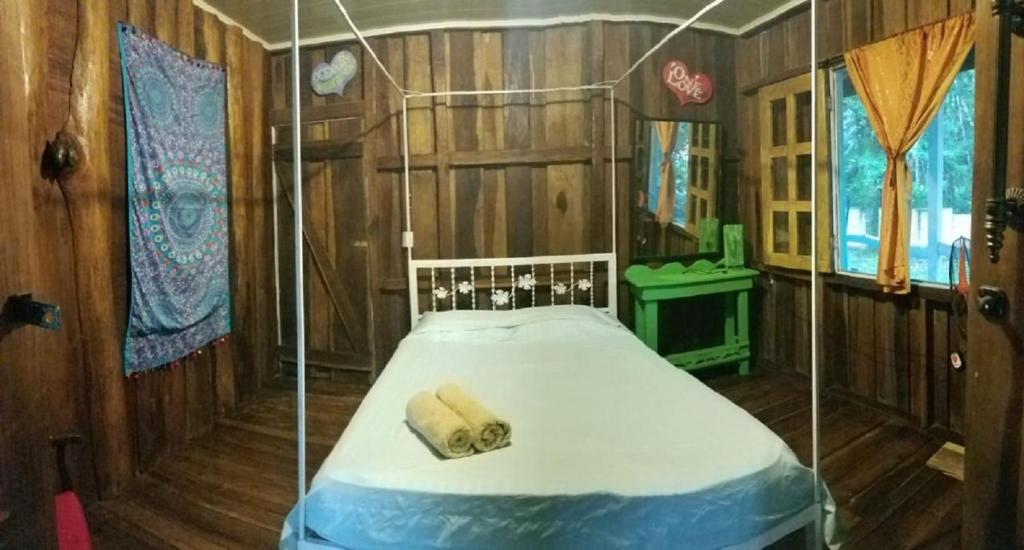 Postel nebo postele na pokoji v ubytování Madre Selva Hostel
