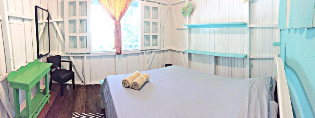 Postel nebo postele na pokoji v ubytování Madre Selva Hostel