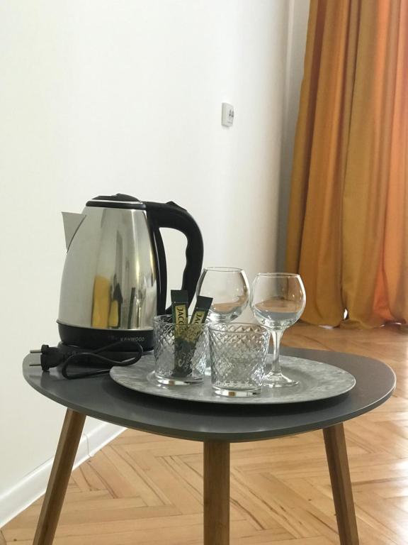 Příslušenství pro přípravu čaje a kávy v ubytování Guest House Story
