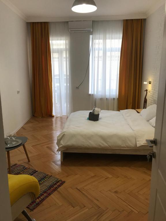 Postel nebo postele na pokoji v ubytování Guest House Story