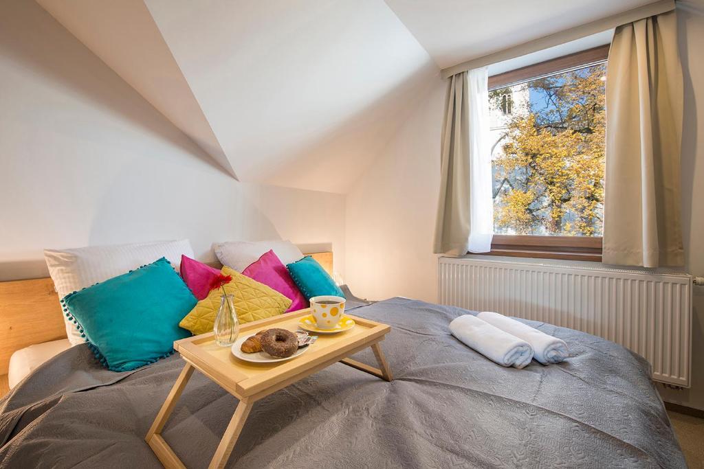 Postel nebo postele na pokoji v ubytování Villa Bellevue Wellness