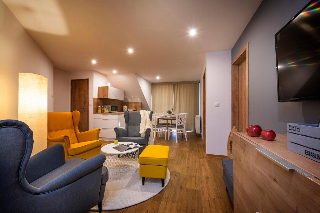 TV a/nebo společenská místnost v ubytování Villa Bellevue Wellness
