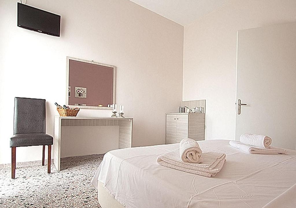 Postel nebo postele na pokoji v ubytování Galazia Nera Apartments