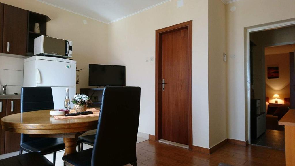 Kuchyň nebo kuchyňský kout v ubytování Apartments Roncevic #JOKO#