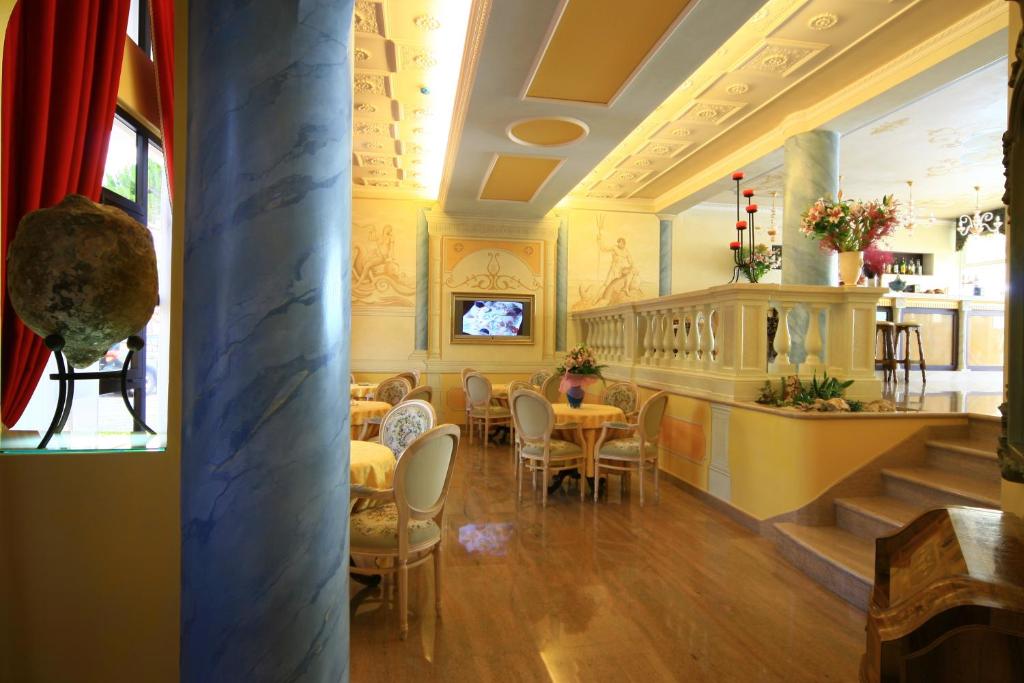 TV a/nebo společenská místnost v ubytování Hotel Danieli