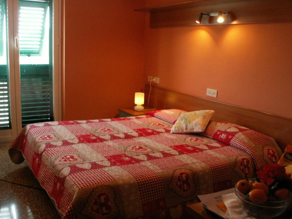 Postel nebo postele na pokoji v ubytování Albergo Caprile