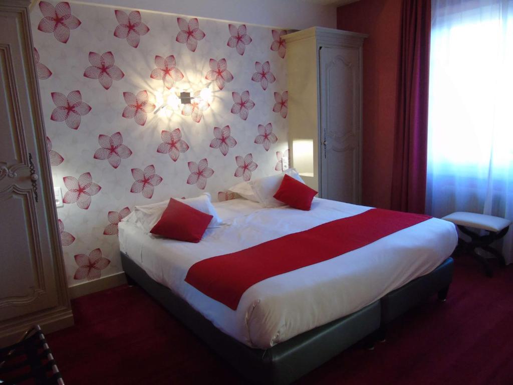 Postel nebo postele na pokoji v ubytování Best Western Hôtel Montgomery