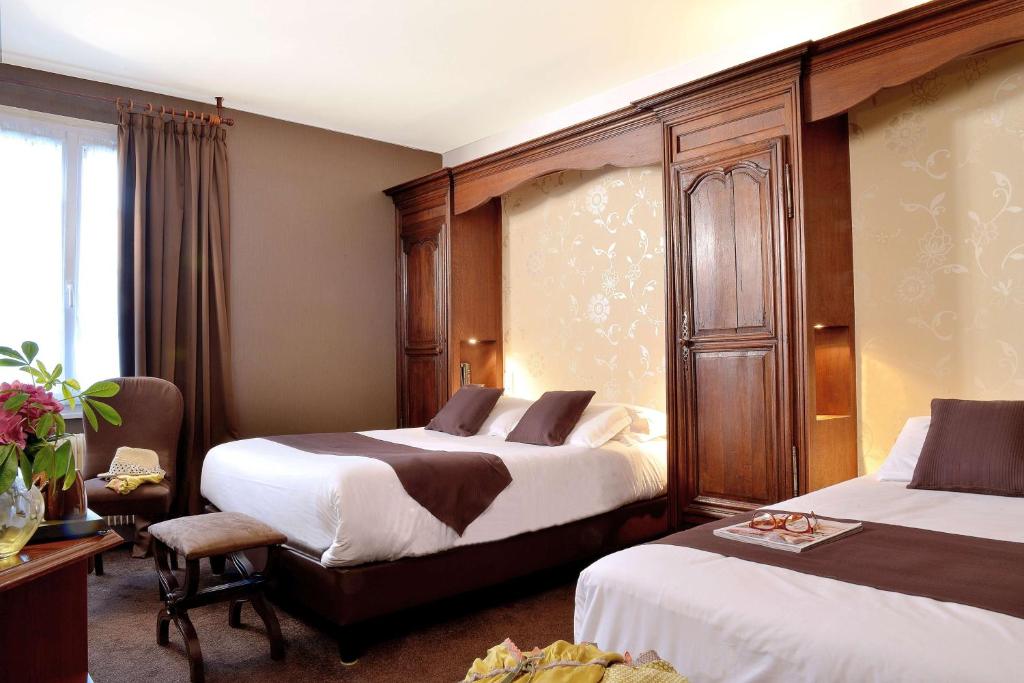 Postel nebo postele na pokoji v ubytování Best Western Hôtel Montgomery