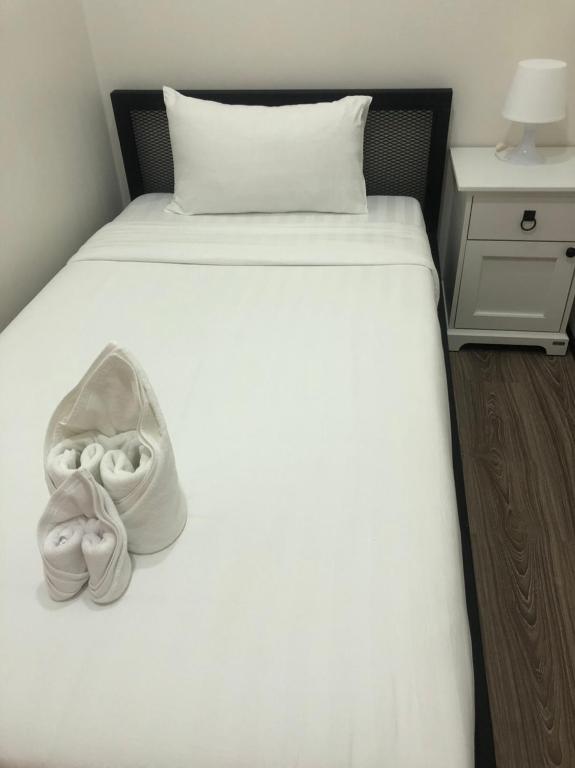 Postel nebo postele na pokoji v ubytování Thyme Xeriscape Hostel