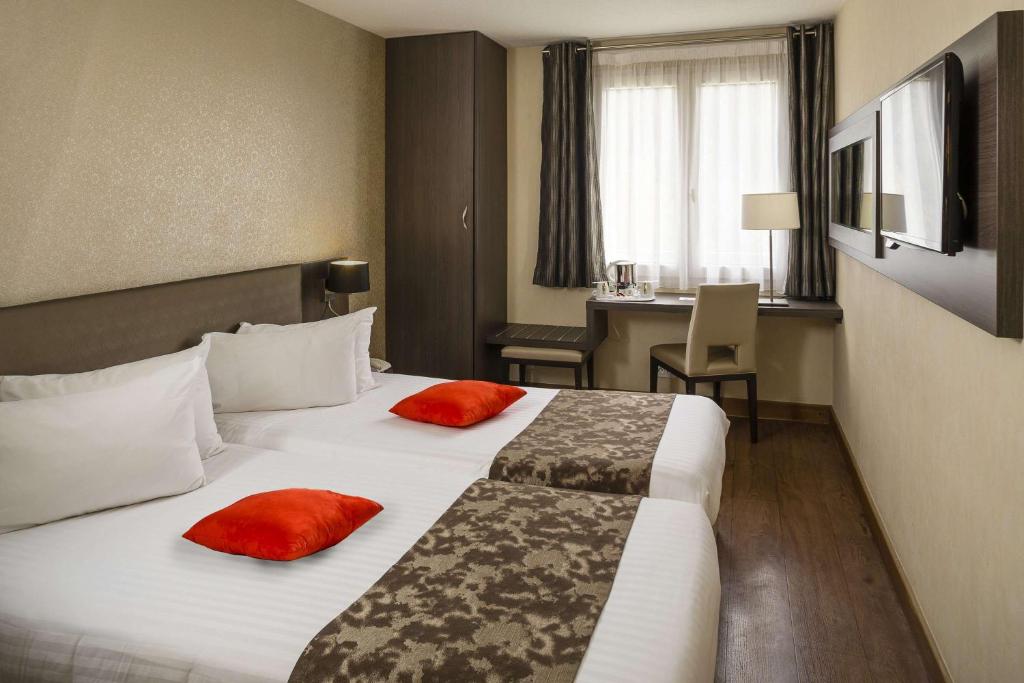 Postel nebo postele na pokoji v ubytování Best Western PLUS Elixir Grasse