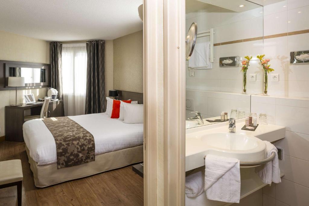 Postel nebo postele na pokoji v ubytování Best Western PLUS Elixir Grasse