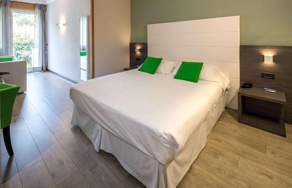Postel nebo postele na pokoji v ubytování Best Western Regina Elena