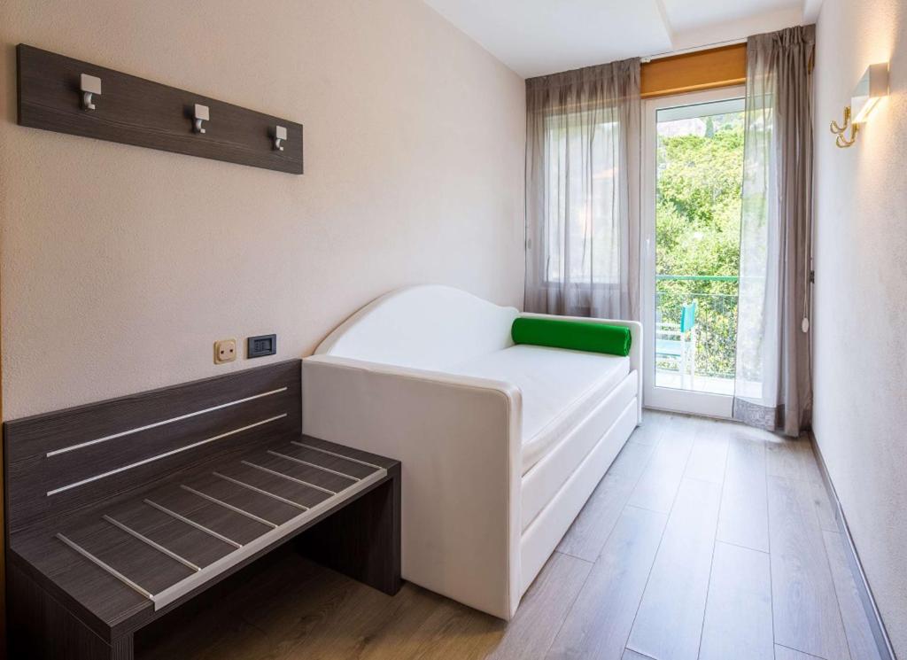 Postel nebo postele na pokoji v ubytování Best Western Regina Elena