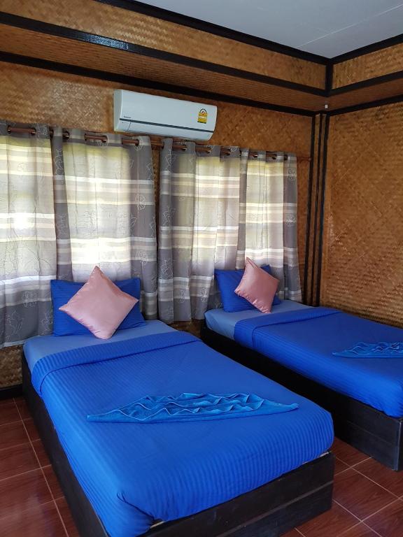 Postel nebo postele na pokoji v ubytování S Beach Resort