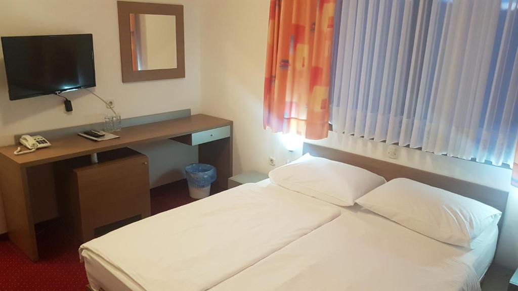 Postel nebo postele na pokoji v ubytování Bed & Breakfast Zeleni Kut