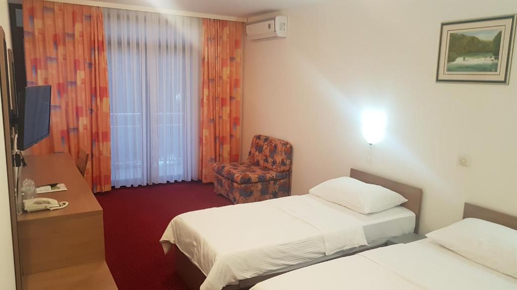 Postel nebo postele na pokoji v ubytování Bed & Breakfast Zeleni Kut