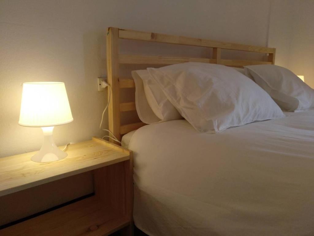 Posteľ alebo postele v izbe v ubytovaní Apartamento 1 Cal Genís - WIFI