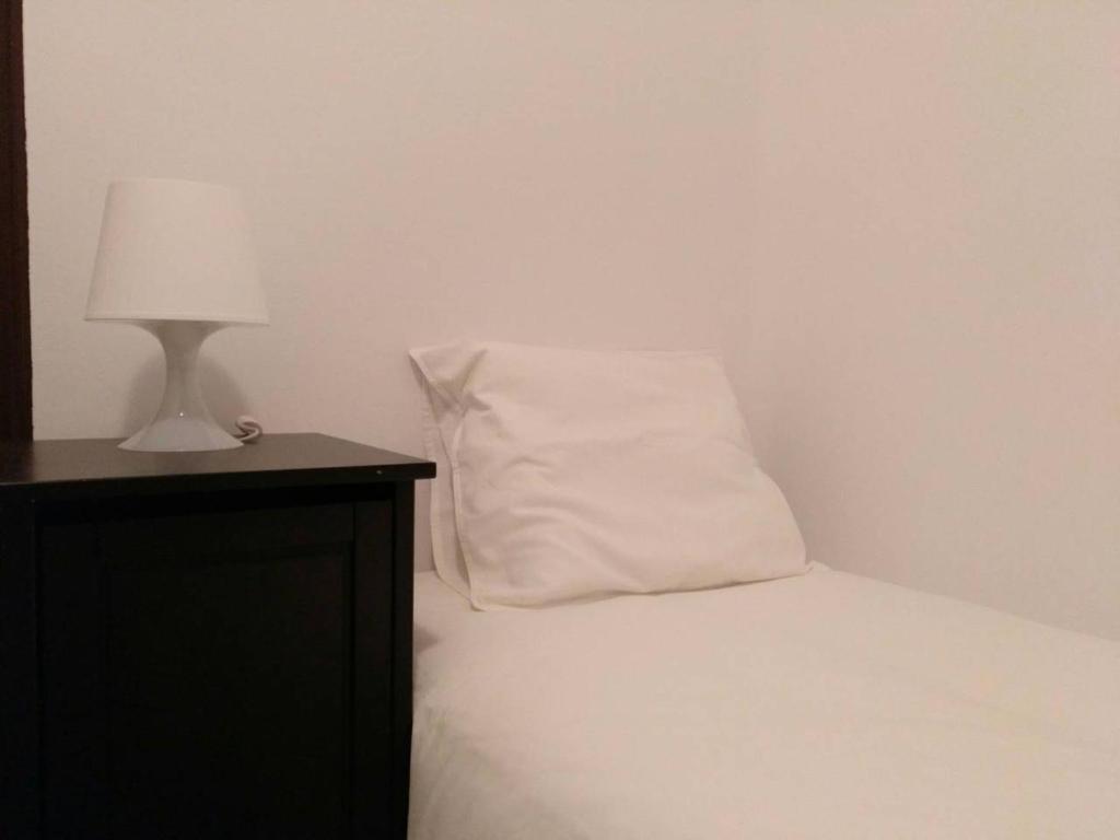 Posteľ alebo postele v izbe v ubytovaní Apartamento 1 Cal Genís - WIFI