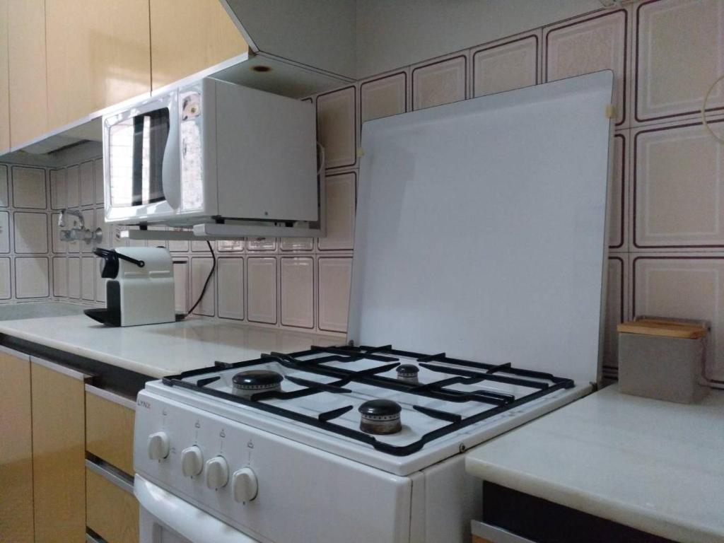 Kuchyňa alebo kuchynka v ubytovaní Apartamento 1 Cal Genís - WIFI