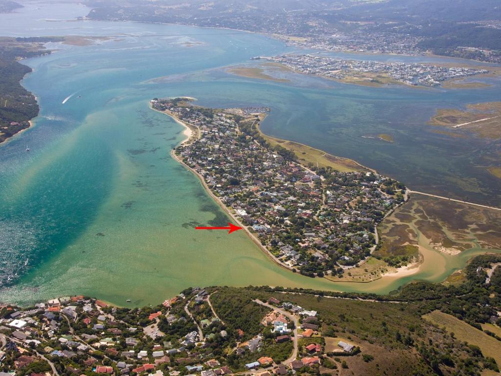 an aerial view of a island in the water at Isola Bella Guest House in Knysna