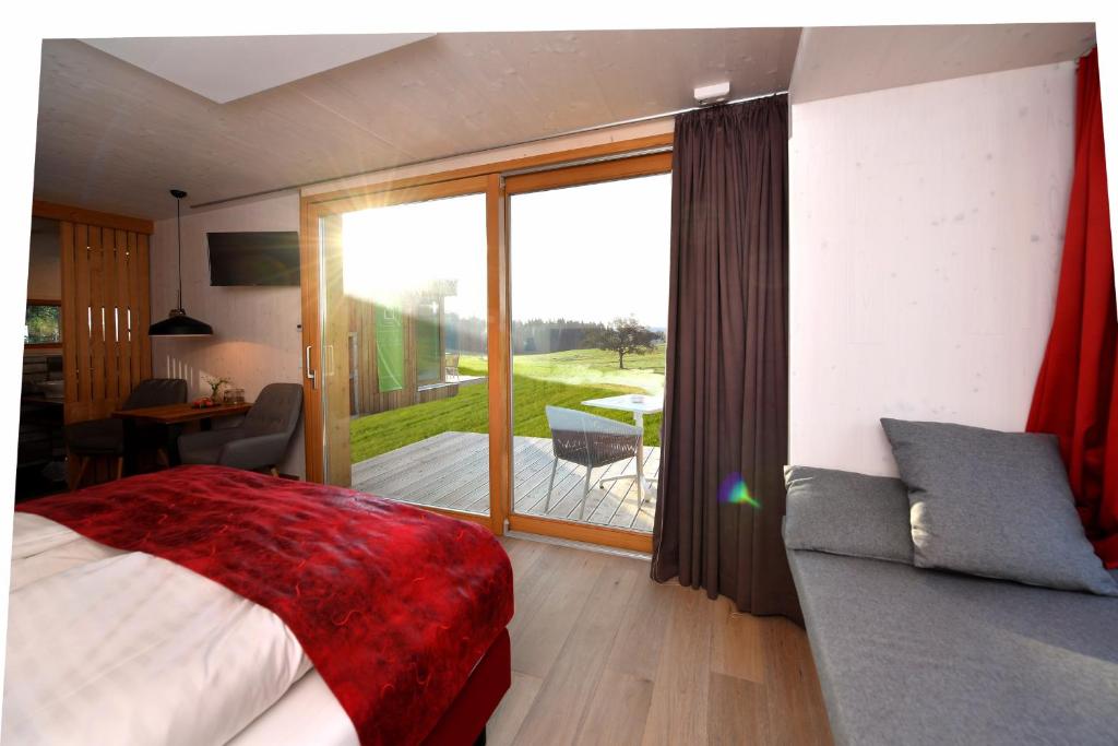 Postel nebo postele na pokoji v ubytování roo'n Lodges#KOLM