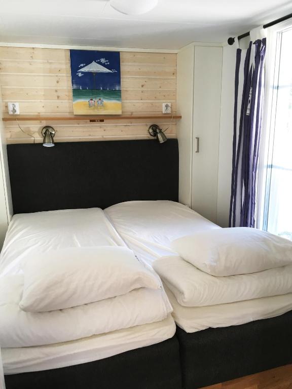 Postel nebo postele na pokoji v ubytování Ronneby Havscamping