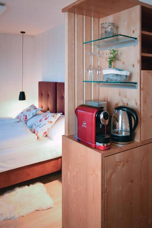 Postel nebo postele na pokoji v ubytování roo'n Lodges#KOLM