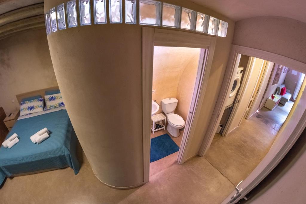 A bed or beds in a room at Casa della Palma